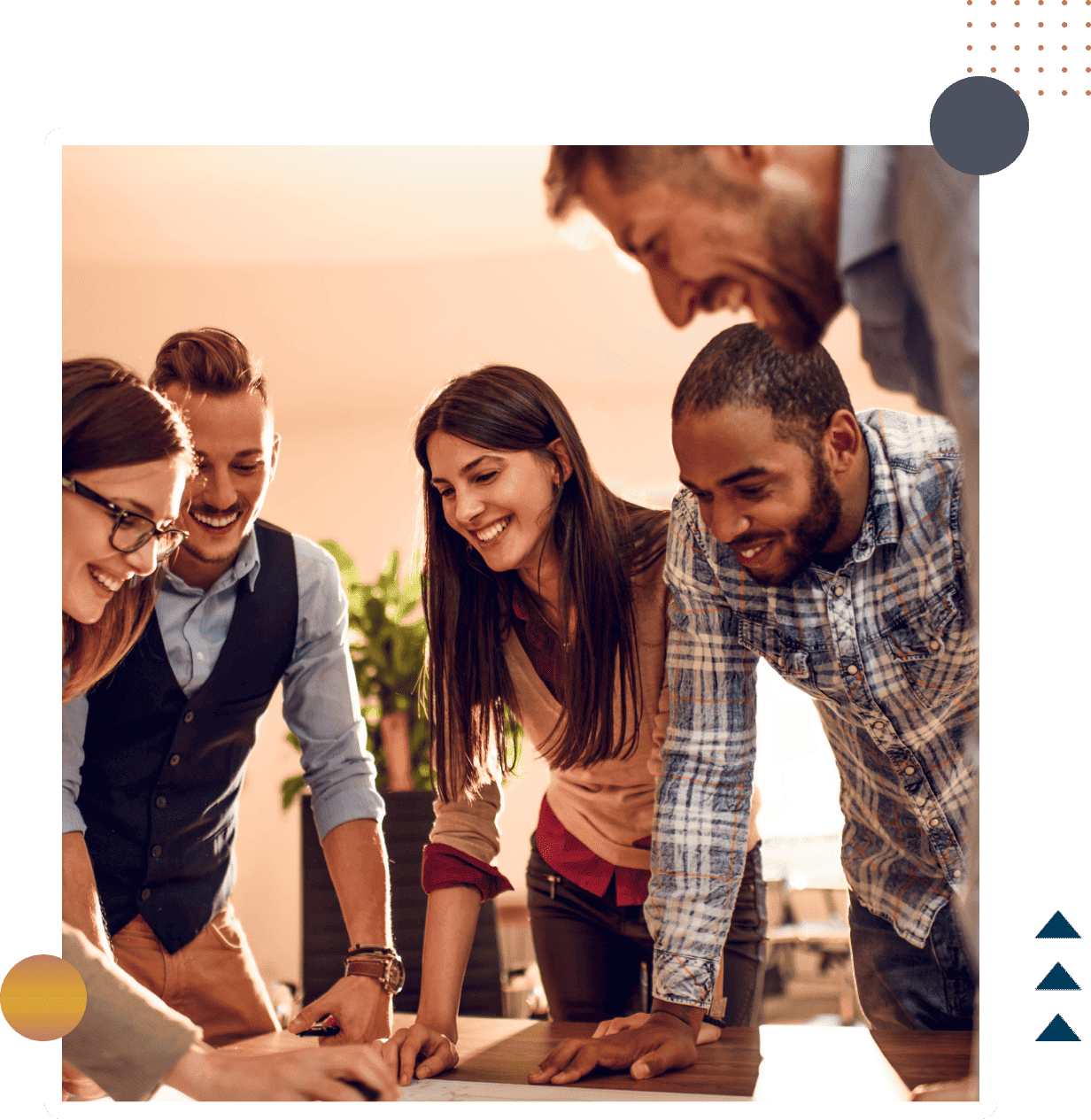 Diverse business team collaborating around a table in a modern office